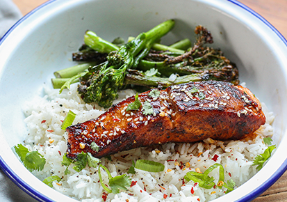 Salmon in sticky cajun honey sauce with green veg 